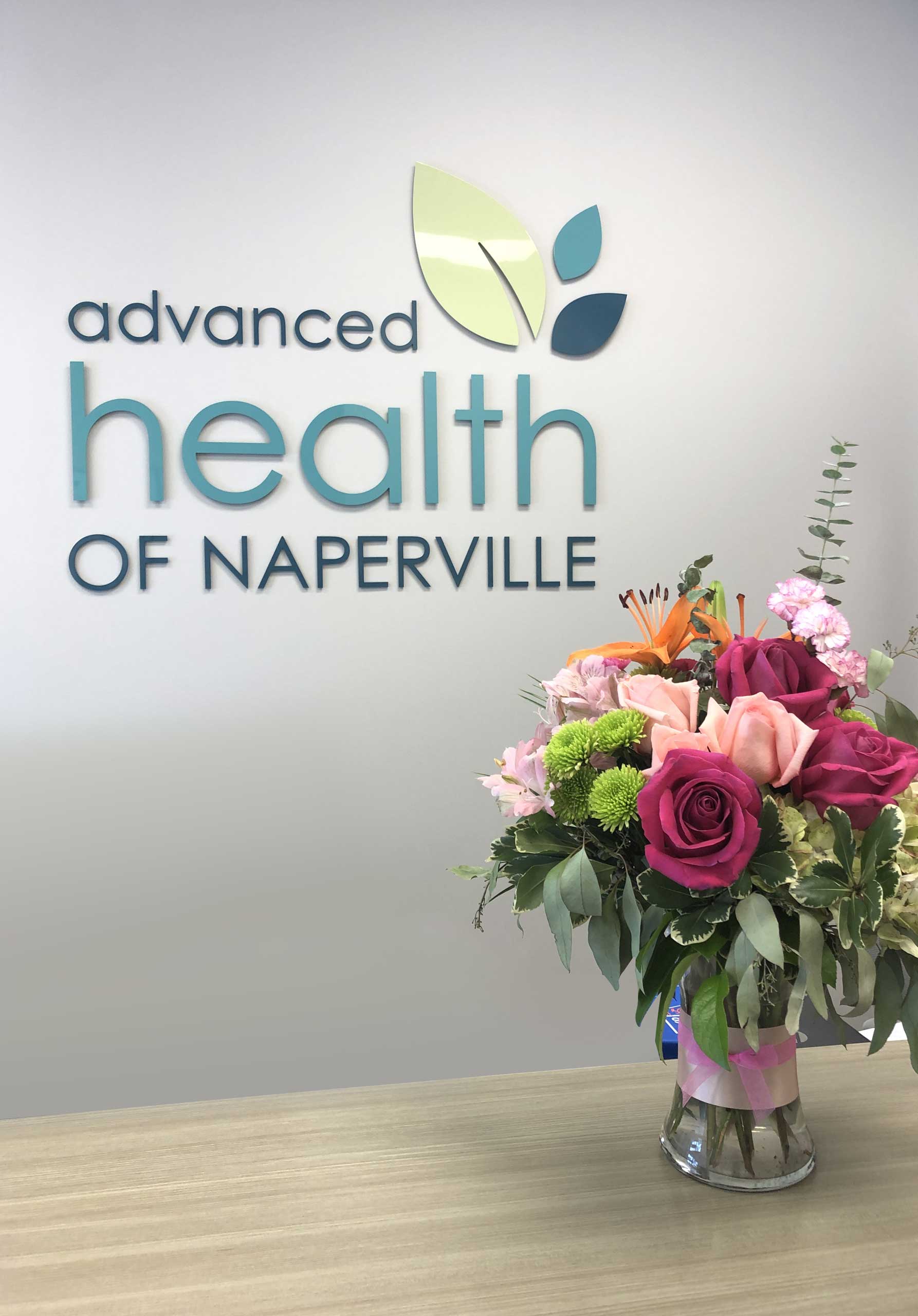 advanced health of naperville logo wall sign